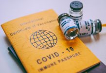 South Africa announces vaccine passport plans, eases restrictions